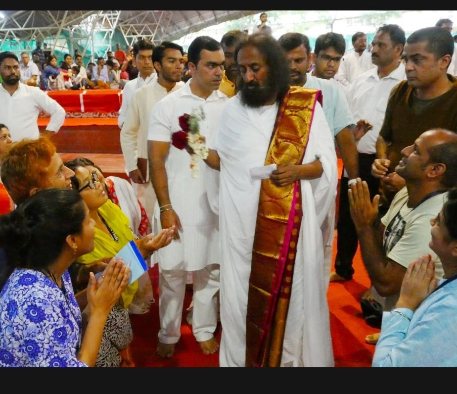 Gurudev sri sri giving darshans to devotees in yagnashala